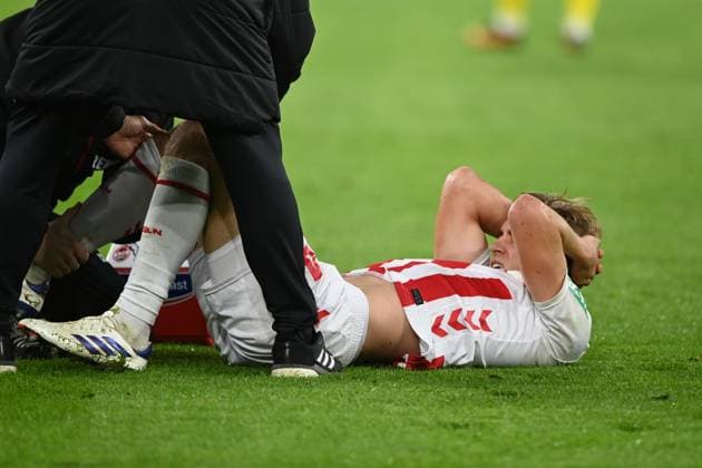 Timo HUEBERS Hübers, K lies injured on the grass, injured, injury, Football 1 Bundesliga, 8 Matchday, matchday8, Borussia Dortmund DO 1 FC Koeln K 1 0 on 25 10 2025 in Dortmund Germany UEFA regulations prohibit any use of photographs as image sequences and or quasi video Â