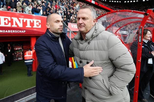 ENSCHEDE, 26-10-2025, Grolsch Veste Stadium, season 2025 2026 , Dutch Eredivisie football Match FC Twente and Ajax. picture shows Ajax trainer John Heitinga, FC Twente coach John van den Brom Twente - Ajax  x31696765x Copyright: