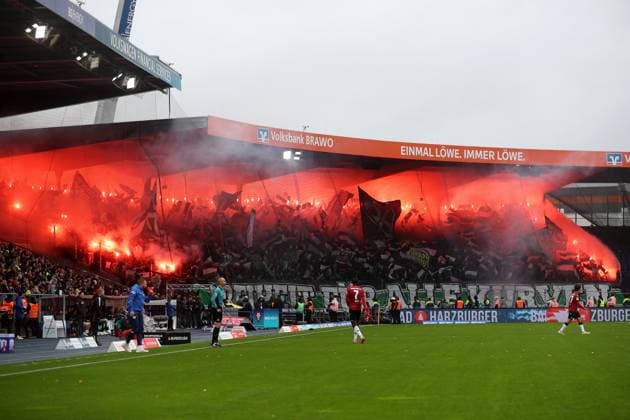 Braunschweig vs Hannover, 2 BL Braunschweig, 26 10 2025, FOOTBALL Eintracht Braunschweig vs Hannover 96, 2 BL, Season 2025 26 Hannover 96 Fans ignite Bengalos Braunschweig