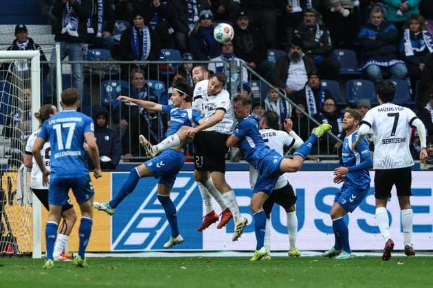 Torge Paetow Preussen Münster,16 vs Jean Hugonet 1 FC Magdeburg,24 and Alexander Ahl Holmström 1 FC Magdeburg,11 2 Soccer Bundesliga Season 2025 2026 1 FC Magdeburg vs Preussen Münster at the Avnet Arena in Magdeburg Action,Soccer,Man,Men,Germany,26 10 2025