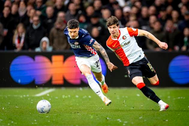 PSV Eindhoven forwarder Dennis Man, SC Feyenoord Rotterdam defender Jordan Bos during the match SC Feyenoord Rotterdam vs PSV Eindhoven at the Stadium de Kuip for the Dutch Vriendenloterij Eredivisie season 2025-2026 in ROTTERDAM, Netherlands on 26 oktober 2025, (photo by Marcel van Dorst EYE4images DeFodi Images) PSV Eindhoven forwarder Dennis Man, SC Feyenoord Rotterdam defender Jordan Bos during the match SC Feyenoord Rotterdam vs PSV Eindhoven at the Stadium de Kuip for the Dutch Vriendenloterij Eredivisie season 2025 2026 in ROTTERDAM, Netherlands on 26 oktober 2025, photo by Marcel van Dorst EYE4images DeFodi Images