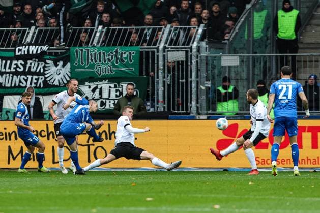 Goalscorer Baris Atik 1 FC Magdeburg,23 scores for 1 0, the goal is disallowed for offside 2 Soccer Bundesliga Season 2025 2026 1 FC Magdeburg vs Preussen Münster at the Avnet Arena in Magdeburg Action,Soccer,Man,Men,Germany,26 10 2025