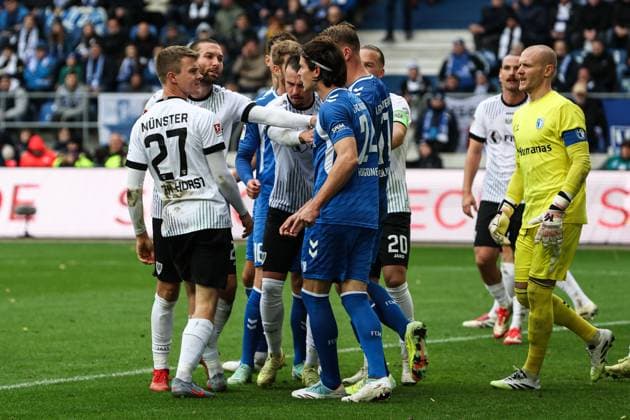 f l Jano ter Horst Preussen Münster,27 , Rico Preissinger Preißinger Preussen Münster,21 , Jean Hugonet 1 FC Magdeburg,24 , Goalkeeper Dominik Reimann 1 FC Magdeburg,1 2 Soccer Bundesliga Season 2025 2026 1 FC Magdeburg vs Preussen Münster at the Avnet Arena in Magdeburg Action,Soccer,Man,Men,Germany,26 10 2025
