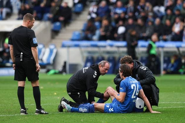 Jean Hugonet 1 FC Magdeburg,24 has to be substituted due to injury 2 Soccer Bundesliga season 2025 2026 1 FC Magdeburg vs Preussen Münster at the Avnet Arena in Magdeburg Action,Soccer,Man,Men,Germany,26 10 2025