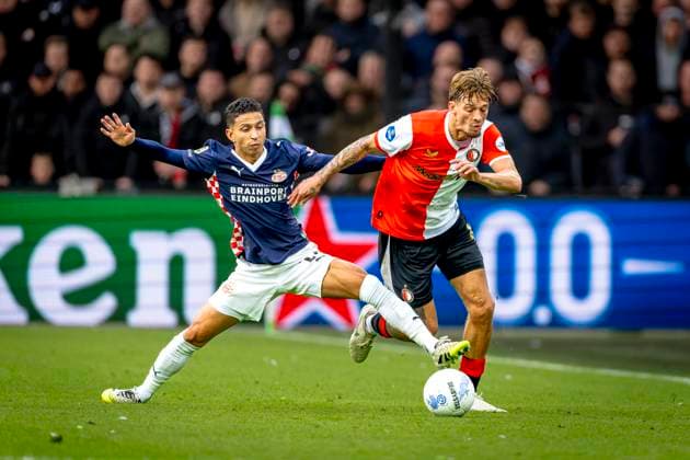 PSV Eindhoven defender Mauro Junior, SC Feyenoord Rotterdam midfielder Luciano Valente during the match SC Feyenoord Rotterdam vs PSV Eindhoven at the Stadium de Kuip for the Dutch Vriendenloterij Eredivisie season 2025-2026 in ROTTERDAM, Netherlands on 26 oktober 2025, (photo by Marcel van Dorst EYE4images DeFodi Images) PSV Eindhoven defender Mauro Junior, SC Feyenoord Rotterdam midfielder Luciano Valente during the match SC Feyenoord Rotterdam vs PSV Eindhoven at the Stadium de Kuip for the Dutch Vriendenloterij Eredivisie season 2025 2026 in ROTTERDAM, Netherlands on 26 oktober 2025, photo by Marcel van Dorst EYE4images DeFodi Images