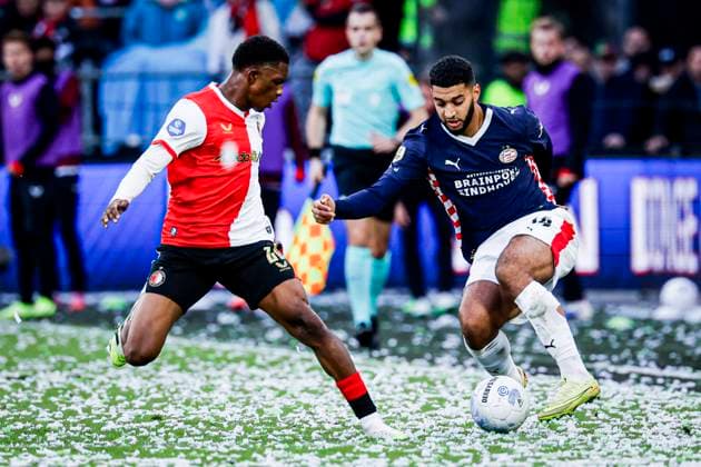 Ismael Saibari of PSV Eindhoven battles for possession with Givairo Read of Feyenoord Rotterdam Feyenoord Rotterdam v PSV Eindhoven, Eredivisie, Feyenoord Rotterdam v PSV Eindhoven, De Kuip, October 26, 2025, Rotterdam, Netherlands.