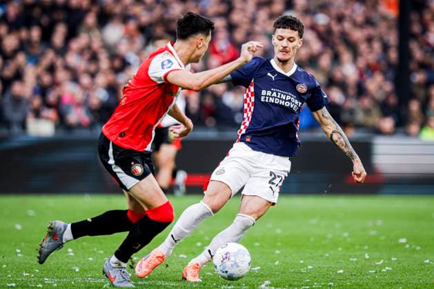 Dennis Man of PSV Eindhoven battles for possession with Anel Ahmedhodzic of Feyenoord Rotterdam Feyenoord Rotterdam v PSV Eindhoven, Eredivisie, Feyenoord Rotterdam v PSV Eindhoven, De Kuip, October 26, 2025, Rotterdam, Netherlands.