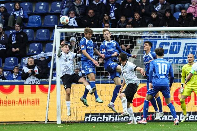 Maximilian Breunig 1 FC Magdeburg,9 and Marcus Mathisen 1 FC Magdeburg,16 2 Soccer Bundesliga Season 2025 2026 1 FC Magdeburg vs Preussen Münster at the Avnet Arena in Magdeburg Action,Soccer,Man,Men,Germany,26 10 2025