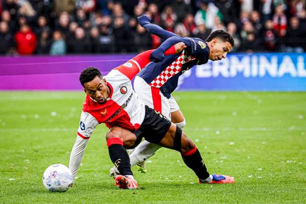 Quinten Timber of Feyenoord Rotterdam battles for possession with Mauro Junior of PSV Eindhoven Feyenoord Rotterdam v PSV Eindhoven, Eredivisie, Feyenoord Rotterdam v PSV Eindhoven, De Kuip, October 26, 2025, Rotterdam, Netherlands.