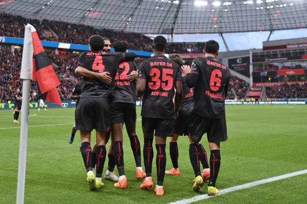 Leverkusen players celebrate Edmond Tapsobas 2 0 Bayer 04 Leverkusen 26 10 2025, Soccer 1 Bundesliga, Season 2025 2026, 8 Matchday, Bayer 04 Leverkusen SC Freiburg DFL regulations prohibit any use of photographs as image sequences and or quasi video Leverkusen BayArena Nordrhein Westfalen Germany Team2