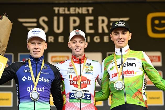 Sencond Dutch Pim Ronhaar, winner Belgian Michael Vanthourenhout and third Belgian Emiel Verstrynge celebrate on the podium of the men s elite race of the Superprestige race of Overijse, stage 2 (out of 8) in the Superprestige cyclocross competition, in Overijse, Sunday 26 October 2025. JASPERxJACOBS  x138019822x