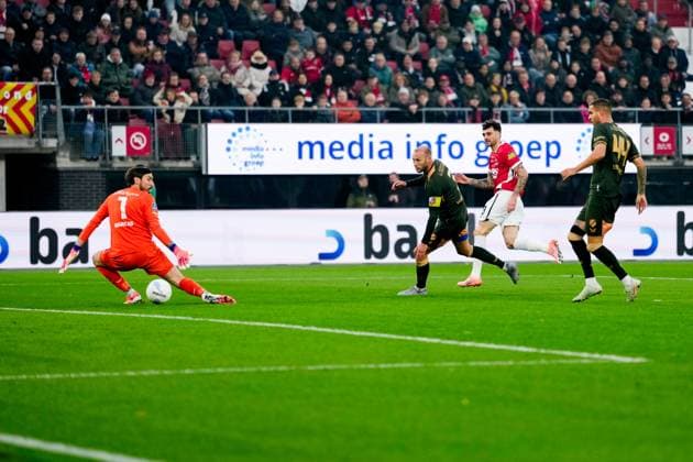 2025-10-26 AZ Alkmaar v FC Utrecht - Dutch Eredivisie ALKMAAR, NETHERLANDS - OCTOBER 26: Goalkeeper Vasilios Barkas of FC Utrecht unable to deflect goal of Troy Parrott of AZ Alkmaar, Mike van der Hoorn of FC Utrecht during the Dutch Eredivisie match between AZ Alkmaar and FC Utrecht at AFAS Stadion on October 26, 2025 in Alkmaar, Netherlands. Alkmaar AFAS Stadion Netherlands Content not available for redistribution in The Netherlands directly or indirectly through any third parties. Copyright: xEdxvanxdexPolx