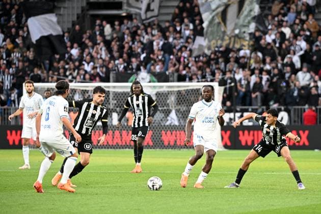 Angers SCO v FC Lorient - Ligue 1 McDonald s 2025 2026 06 Louis MOUTON (sco) - 44 Darlin YONGWA (fcl) - 14 Yassin BELKHDIM (sco) during the Ligue 1 McDonald s match between Angers and Lorient at Stade Raymond Kopa on October 26, 2025 in Angers, France. Angers France  Copyright: xFEPx 776348172