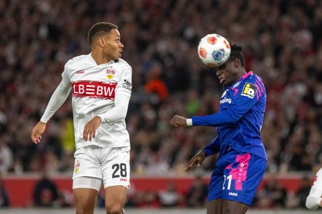 Nikolas Terkelsen Nartey VfB Stuttgart and Danny Da Costa 1 FSV Mainz 05 xettx, Germany, Stuttgart, 26 10 2025, Football, Bundesliga VfB Stuttgart vs 1 FSV Mainz 05, Season 2025 2026, Matchday 8, MHP Arena DFL DFB REGULATIONS PROHIBIT ANY USE OF PHOTOGRAPHS AS IMAGE SEQUENCES AND OR QUASI VIDEO