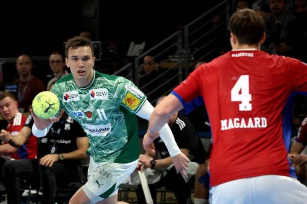 DEU, DHB, 1 HBL, Fuechse Berlin vs HSV, 26 10 2025, Max Schmeling Halle, Berlin, DEU, DHB, 1 HBL, Fuechse Berlin vs HSV, in the picture Lasse Andersson Fuechse Berlin 11 , Andreas Magaard HSV Hamburg 4 nordphotoxGmbHx xEngler nph00076
