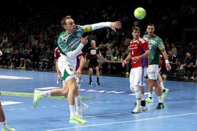 DEU, DHB, 1 HBL, Fuechse Berlin vs HSV, 26 10 2025, Max Schmeling Halle, Berlin, DEU, DHB, 1 HBL, Fuechse Berlin vs HSV, in the picture Mathias Gidsel Fuechse Berlin 19 , Mijajlo Marsenic Fuechse Berlin 93 , Andreas Magaard HSV Hamburg 4 nordphotoxGmbHx xEngler nph00076