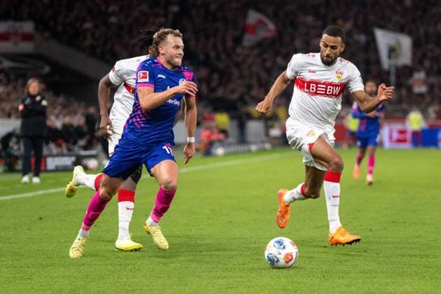 Dan Axel Zagadou VfB Stuttgart , Benedict Hollerbach 1 FSV Mainz 05 and Josha Vagnoman VfB Stuttgart xettx, Germany, Stuttgart, 26 10 2025, Football, Bundesliga VfB Stuttgart vs 1 FSV Mainz 05, Season 2025 2026, Matchday 8, MHP Arena DFL DFB REGULATIONS PROHIBIT ANY USE OF PHOTOGRAPHS AS IMAGE SEQUENCES AND OR QUASI VIDEO