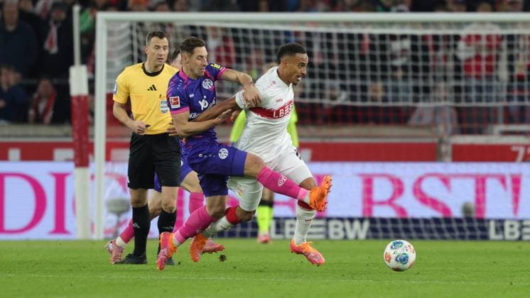 Stuttgart, Bundesliga soccer VfB Stuttgart vs 1 FSV Mainz 05, f l Dominik Kohr Mainz Jamie Leweling VfB According to the regulations of the DFL German Soccer League, it is prohibited to use or have used photographs taken in the stadium and or of the match in the form of sequential images and or video-like photo series