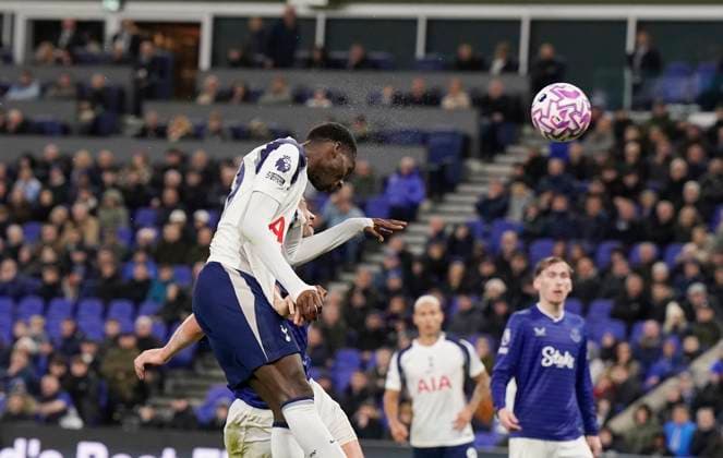 Liverpool, England, 26th October 2025. Pape Matar Sarr of Tottenham heads their third goal during the Everton vs Tottenham Hotspur Premier League match at Hill Dickinson Stadium, Liverpool. Picture credit should read: Andrew Yates Sportimage EDITORIAL USE ONLY. No use with unauthorised audio, video, data, fixture lists, club league logos or live services. Online in-match use limited to 120 images, no video emulation. No use in betting, games or single club league player publications. SPI_058_AY_Everton_Spurs SPI-4241-0058