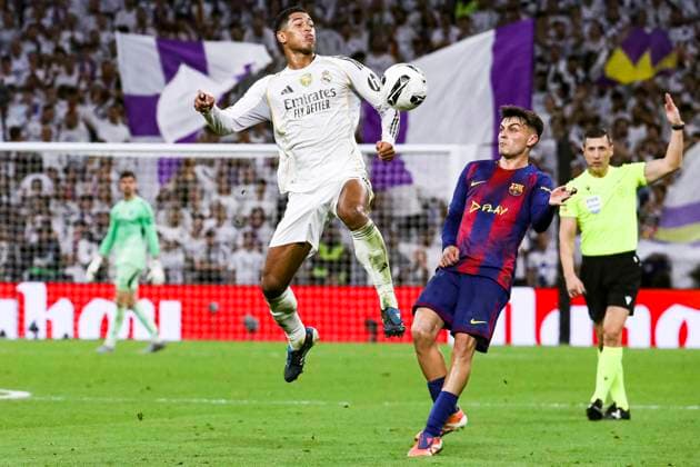 Spanish La Liga EA Sports soccer match Real Madrid vs FC Barcelona, Barca at Santiago Bernabeu Stadium in Madrid, Spain. 26 October 2025 Jude Bellingham and Pedri 900 Cordon Press  900 CordonxPress LOF - Real Madrid vs FC Barcelona