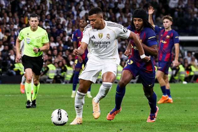 Spanish La Liga EA Sports soccer match Real Madrid vs FC Barcelona, Barca at Santiago Bernabeu Stadium in Madrid, Spain. 26 October 2025 Kylian Mbappe and Kounde 900 Cordon Press  900 CordonxPress LOF - Real Madrid vs FC Barcelona
