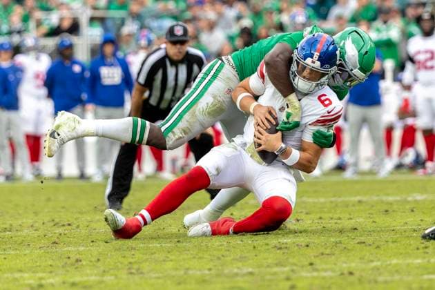 New York Giants quarterback Jaxson Dart (6) is sacked by Philadelphia Eagles linebacker Jalyx Hunt (58) during the third quarter at Lincoln Financial Field in Philadelphia on Sunday, October 26, 2025.  PHI20251026017 LAURENCExKESTERSON
