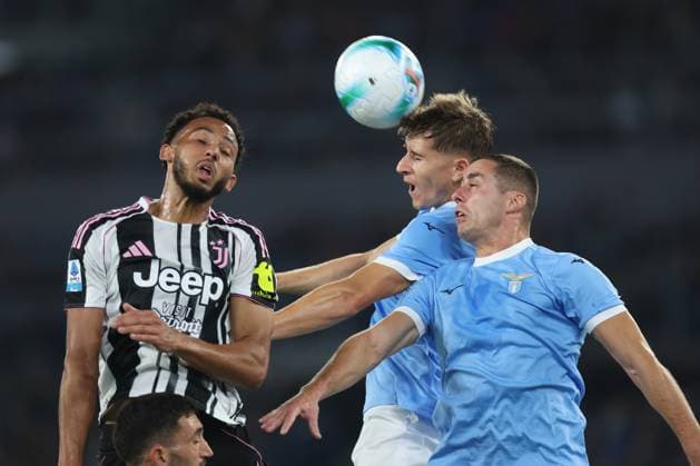 Football: Serie A Enilive 2025-2026 matchday, SS Lazio vs Juventus FC Turin Rome, Italy October 26, 2025: Lloyd Kelly of Juventus F.C. , Toma Basic of Lazio, Adam Marusic of Lazio seen in action during the Serie A Enilive 2025-2026 football match day 8, between SS Lazio vs Juventus FC Turin at Olympic Stadium. rome olympic stadium italy italy Copyright: xmarcoxiacobucci