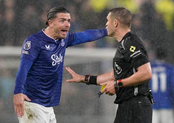 Liverpool, England, 26th October 2025. Jack Grealish of Everton (L) talks to Referee Craig Pawson during the Everton vs Tottenham Hotspur Premier League match at Hill Dickinson Stadium, Liverpool. Picture credit should read: Andrew Yates Sportimage EDITORIAL USE ONLY. No use with unauthorised audio, video, data, fixture lists, club league logos or live services. Online in-match use limited to 120 images, no video emulation. No use in betting, games or single club league player publications. SPI_078_AY_Everton_Spurs. SPI-4241-0077