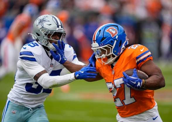 October 26, 2025: Denver Broncos running back J.K. Dobbins (27) is pushed out of bounds by Dallas Cowboys safety Alijah Clark (38) after a long run in the first half of the football game between the Denver Broncos and Dallas Cowboys. CSM. - ZUMAc04_ 20251026_zma_c04_206 Copyright: xDerekxRegensburgerx