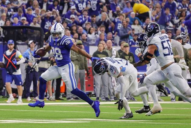 October 26, 2025, Indianapolis, Indiana, U.S: Indianapolis Colts running back Jonathan Taylor (28) stiff arms Tennessee Titans safety Amani Hooker (37) on a run during the game between the Tennessee Titans and the Indianapolis Colts at Lucas Oil Stadium, Indianapolis, Indiana. Indianapolis U.S - ZUMAs304 20251026_zaf_s304_036 Copyright: xScottxStuartx