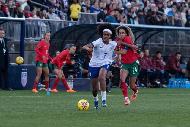 October 26, 2025, Bronx, New York, USA: Lily Yohannes (7) of USWNT and Dolores Silva (14) of Portugal during friendly game at Pratt & Whitney Stadium at Rentschler Field in East Hartford, CT on October 26, 2025. USWNT won 3 - 1. Bronx USA - ZUMAr339 20251026_znp_r339_062 Copyright: xLevxRadinx