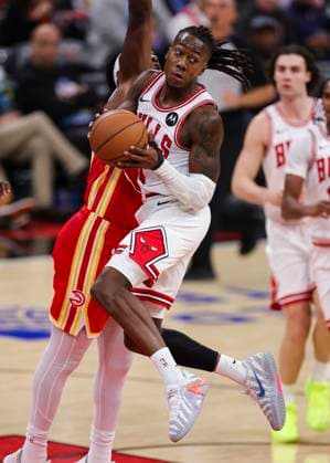 (251028) -- CHICAGO, Oct. 28, 2025 -- Ayo Dosunmu of Chicago Bulls tries to pass the ball during the NBA, Basketball Herren, USA regular season basketball game between Chicago Bulls and Atlanta Hawks at United Center in Chicago, the United States, on Oct. 27, 2025. (Photo by Xinhua) (SP)U.S.-CHICAGO-BASKETBALL-NBA-CHICAGO BULLS VS ATLANTA HAWKS JoelxLerner 