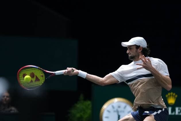 October 28, 2025, Nanterre, Hauts De Seine, France: VALENTIN VACHEROT (MON) returns the ball to JIRI LEHECKA (CZE) during the first round of Rolex Paris Masters 1000 tournament at La Defense Arena Stadium - Nanterre - France..Vacherot won 6:1 6:3 Nanterre France - ZUMAp119 20251028_zaf_p119_014 Copyright: xPierrexSteveninx