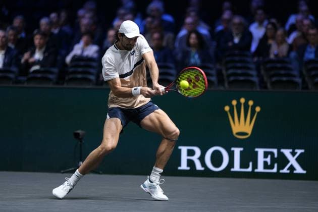 October 28, 2025, Nanterre, Hauts De Seine, France: VALENTIN VACHEROT (MON) returns the ball to JIRI LEHECKA (CZE) during the first round of Rolex Paris Masters 1000 tournament at La Defense Arena Stadium - Nanterre - France..Vacherot won 6:1 6:3 Nanterre France - ZUMAp119 20251028_zaf_p119_015 Copyright: xPierrexSteveninx