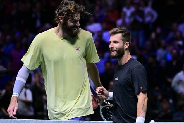 TENNIS : Rolex Paris Masters - Paris - 28 10 2025 Corentin MOUTET ( France ) talks with Reilly Opelka ( USA ) during the Rolex Paris Masters at Paris La Defense Arena on October 28, 2025 in Nanterre, France. (Photo by Federico Pestellini PSNewz ) ParisFrance  Copyright: xFedericoxPestellinix