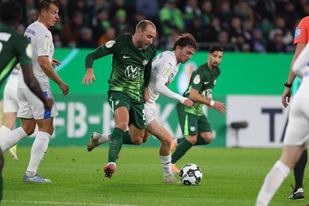 VfL vs Kiel, 2 round DFB Pokal Wolfsburg, 28 10 2025, FOOTBALL VfL Wolfsburg vs Holstein Kiel, 2 round DFB Pokal, season 2025 26 Christian Eriksen VfL Wolfsburg , Magnus Knudsen Holstein Kiel Wolfsburg