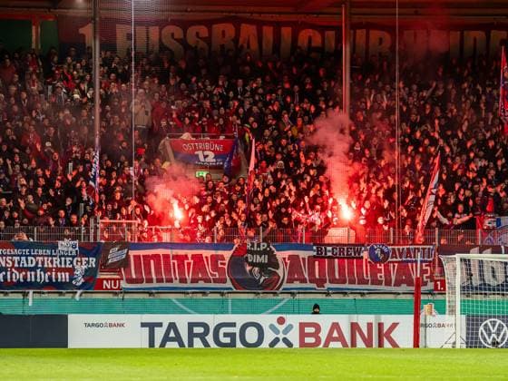 The fans of 1 FC Heidenheim send Bengalos, GER, 1 FC Heidenheim vs Hamburger SV, Football, DFB Pokal, Season 2025 2026, 28 10 2025, DFB DFL regulations prohibit any use of photographs as image sequences and or quasi video GER, 1 FC Heidenheim vs Hamburger SV, Football, DFB Pokal, Season 2025 2026, 28 10 2025 Heidenheim Copyright: xMichaelxSchmidt Eibner-Pressefotx EP_MST