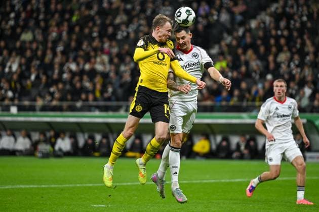 Maximilian Beier Dortmund, 14 in duel with Robin Koch Eintracht Frankfurt, 04 , GER, Eintracht Frankfurt vs Borussia Dortmund Football DFB Pokal, 2 Round, Season 2025 2026, 28 10 2025 DFB regulations prohibit any use of photographs as image sequences and or quasi video GER, Eintracht Frankfurt vs Borussia Dortmund Football DFB Pokal, 2 Round, Season 2025 2026, 28 10 2025 Frankfurt am Main Copyright: xEibner-Pressefoto FlorianxWiegandx EP_FWD