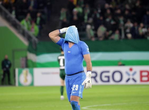 Disappointed Marius Mueller VfL Wolfsburg Football, Season 2025 2026, Men, Men, DFB Cup, 2nd main round, Volkswagenarena Wolfsburg, VfL Wolfsburg vs Holstein Kiel, 0 1 DFL REGULATIONS PROHIBIT ANY USE OF PHOTOGRAPHS AS IMAGE SEQUENCES AND OR QUASI VIDEO