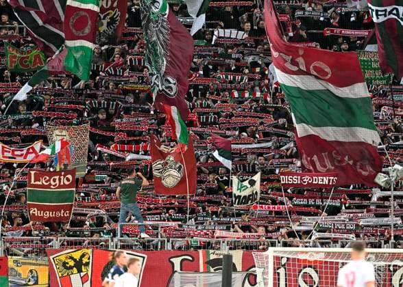 28 10 2025, Football DFB Cup 2025 2026, 2nd round, FC Augsburg VfL Bochum, in the WWK Arena Augsburg The Augsburg fans cheer on their team DFL and DFB regulations prohibit any use of photographs as image sequences and or quasi video