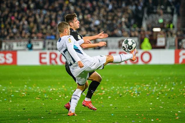 Soccer I Men I Season 2025 2026 I DFB Cup I 2 Round I FC St Pauli TSG 1899 Hoffenheim I 28 10 2025 Arkadiusz Pyrka 11, FC St Pauli , Andrej Kramaric 27, TSG 1899 Hoffenheim Hamburg Millerntor Stadion Hamburg Germany Copyright: xLobecax xHenningxRohlfsx