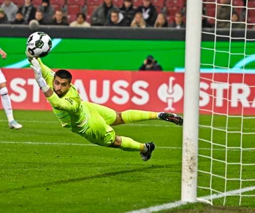 28 10 2025, Soccer DFB Pokal 2025 2026, 2 Round, FC Augsburg VfL Bochum, at WWK Arena Augsburg Goalkeeper Nediljko Labrovic FC Augsburg chases the ball DFL and DFB regulations prohibit any use of photographs as image sequences and or quasi video
