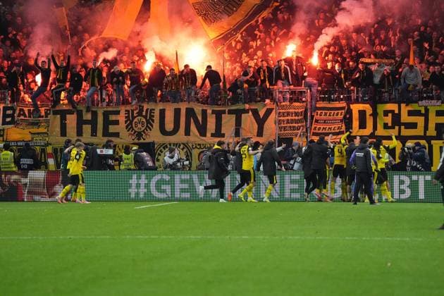 Dortmund players celebrate with their fans as the winner remains Frankfurt 28 10 2025 Eintracht Frankfurt vs Borussia Dortmund, Deutsche Bank Park, 2nd round DFB Pokal