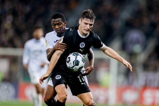 Hamburg, 28 October 2025 Football, DFB Pokal 2025 26, FC St Pauli TSG 1899 Hoffenheim Arkadiusz Pyrka FC St Pauli, 11 , Bazoumana Toure TSG 1899 Hoffenheim, 29 DFL REGULATIONS PROHIBIT ANY USE OF PHOTOGRAPHS AS IMAGE SEQUENCES AND OR QUASI VIDEO