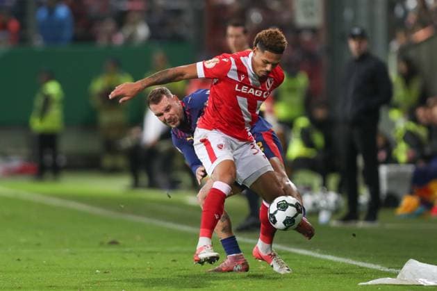 28 10 2025, xtgx, Football DFB Cup 2nd round, FC Energie Cottbus RB Leipzig emspor, v l David Raum Leipzig, 22 , Justin Butler Cottbus, 31 duel, fight, tackle DFL DFB REGULATIONS PROHIBIT ANY USE OF PHOTOGRAPHS as IMAGE SEQUENCES and or QUASI VIDEO Cottbus
