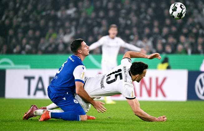 Football, DFB Cup, Germany, Men, Season 2025 2026, 2 Round, Borussia Park Mönchengladbach, Bor Mönchengladbach Karlsruher SC Nicolai Rapp KSC , Haris Tabakovic BMG Action