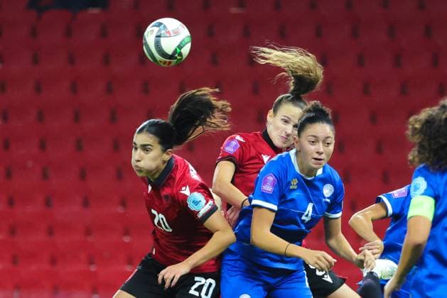 October 28, 2025, Tirana, Tirana, Albania: Andrea Cusick of Cyprus in action against Klea Hamonikaj and Arbiona Bajraktari of Albania during their FIFA Women s World Cup 2027 Promotion Relegation play-off match Albania vs Cyprus at Air Albania Stadium in Tirana, Albania on 28 October 2025. Tirana Albania - ZUMAb266 20251028_zip_b266_028 Copyright: xArmandoxBabanix