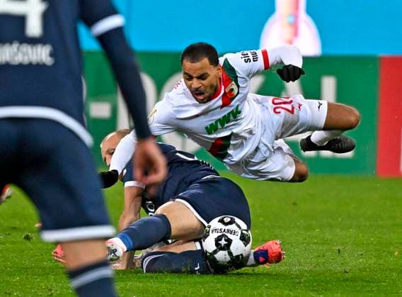 28 10 2025, Football DFB Pokal 2025 2026, 2 Round, FC Augsburg VfL Bochum, in the WWK Arena Augsburg Alexis Julian Claude Maurice FC Augsburg takes off DFL and DFB regulations prohibit any use of photographs as image sequences and or quasi video