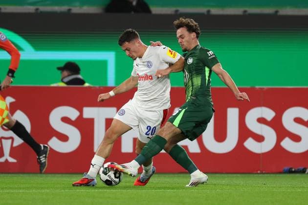 VfL vs Kiel, 2 round DFB Pokal Wolfsburg, 28 10 2025, FOOTBALL VfL Wolfsburg vs Holstein Kiel, 2 round DFB Pokal, season 2025 26 Adrian Kapralik Holstein Kiel , Aaron Zehnter VfL Wolfsburg Wolfsburg