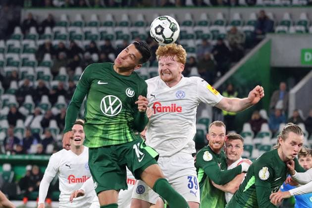 VfL vs Kiel, 2 Round DFB Cup Wolfsburg, 28 10 2025, FOOTBALL VfL Wolfsburg vs Holstein Kiel, 2 Round DFB Cup, Season 2025 26 Adam Daghim VfL Wolfsburg , Robert Wagner Holstein Kiel Wolfsburg